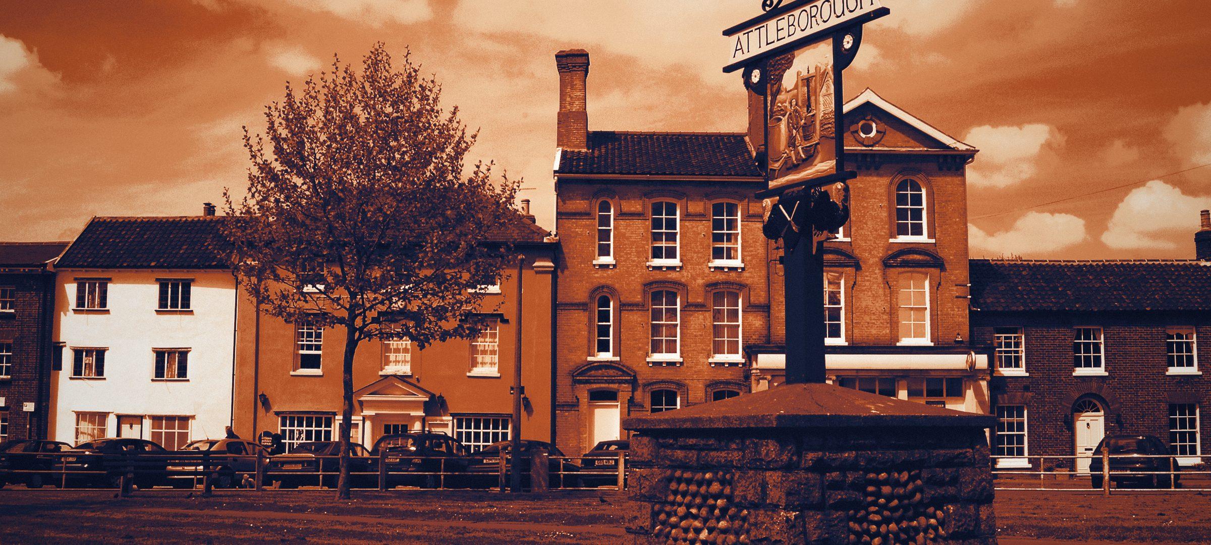 Attleborough town sign on the green, Norfolk.
